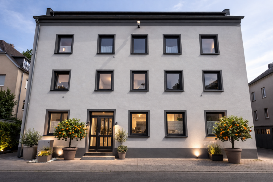 Symbolbild KI generiert Mehrfamilienhaus Frontenhausen