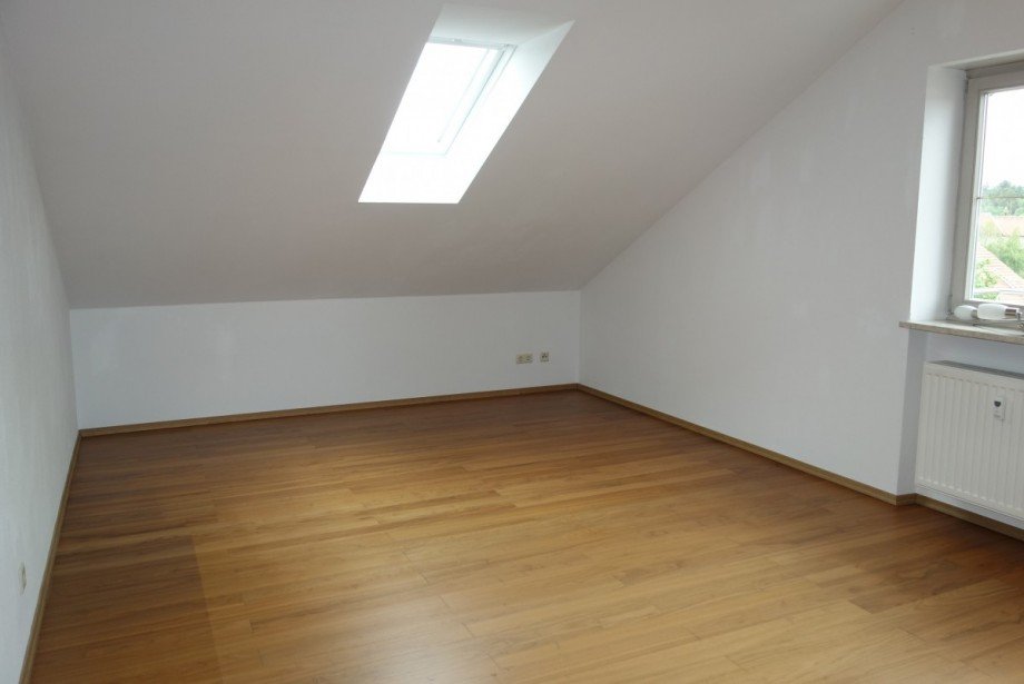 Wohnzimmer Dachgeschosswohnung Tacherting